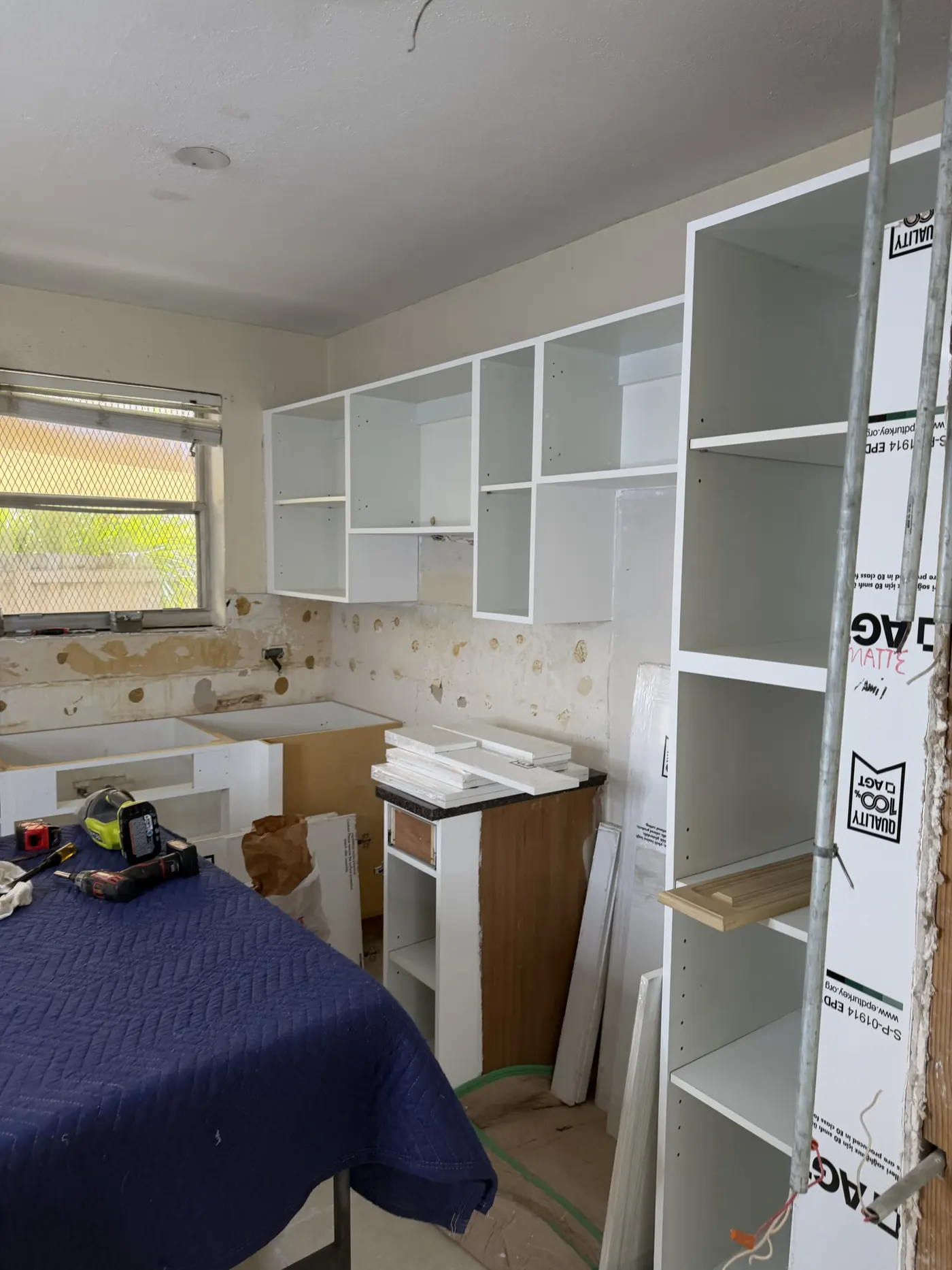 Kitchen cabinet installation in Homestead, FL, full cabinet run visible